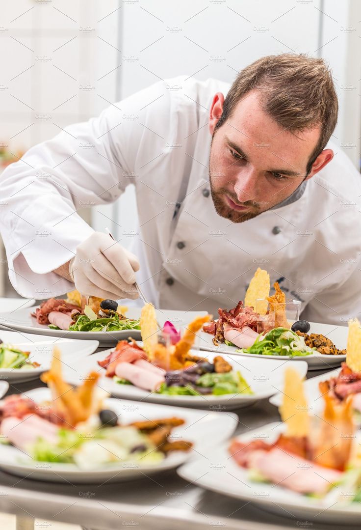 Chef preparing signature dish at FoodBiz